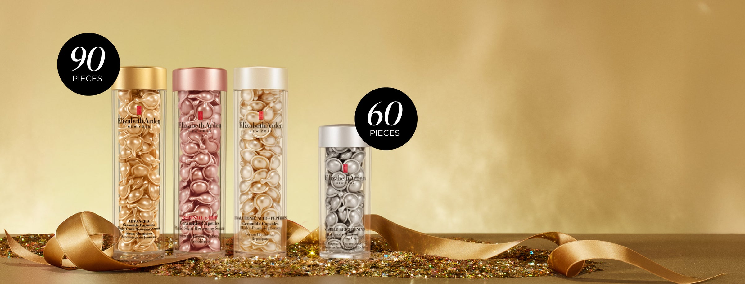 Three capsules jars showing 90-piece capsules and 60-piece capsules on gold background with glitter and ribbon
