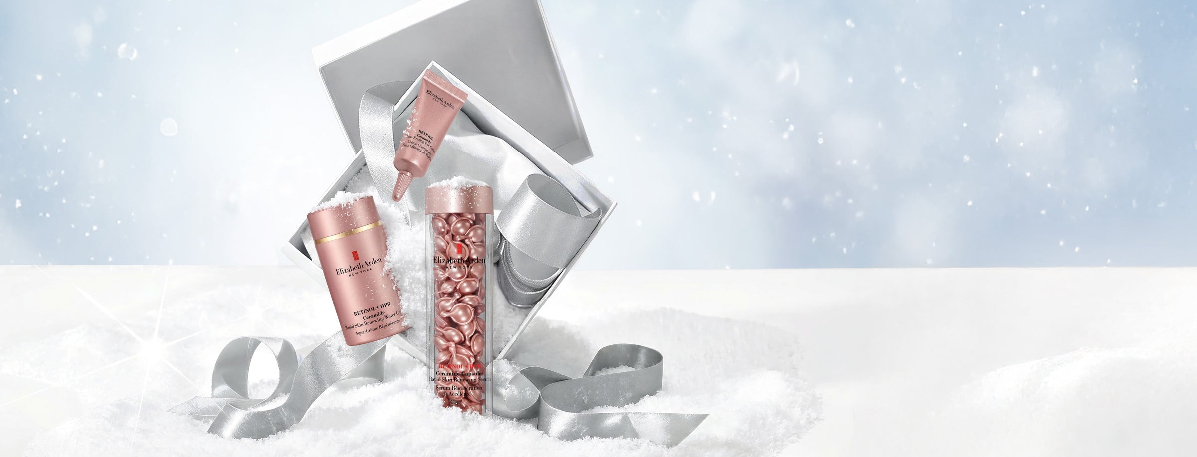 Elizabeth Arden Retinol skincare products on a snowy background