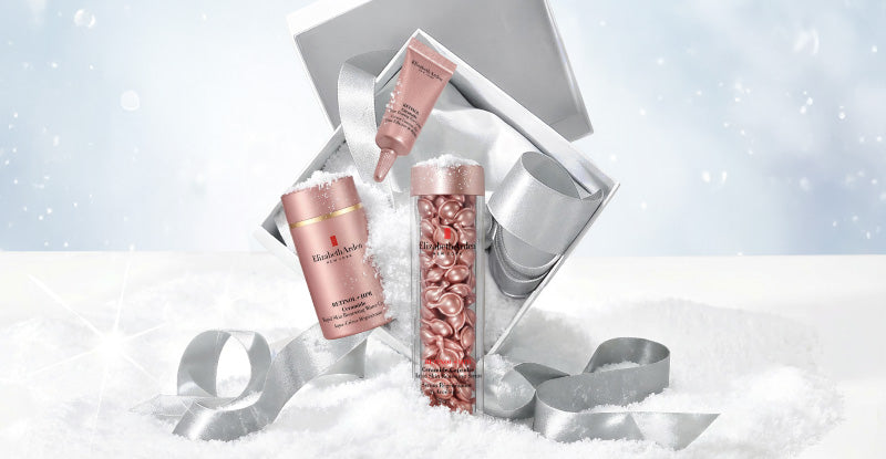 Elizabeth Arden Retinol skincare products on a snowy background