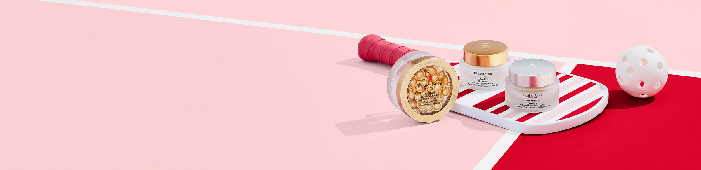 Set of ceramide skincare products on a pink and red background with pickleball stripe paddle and ball.