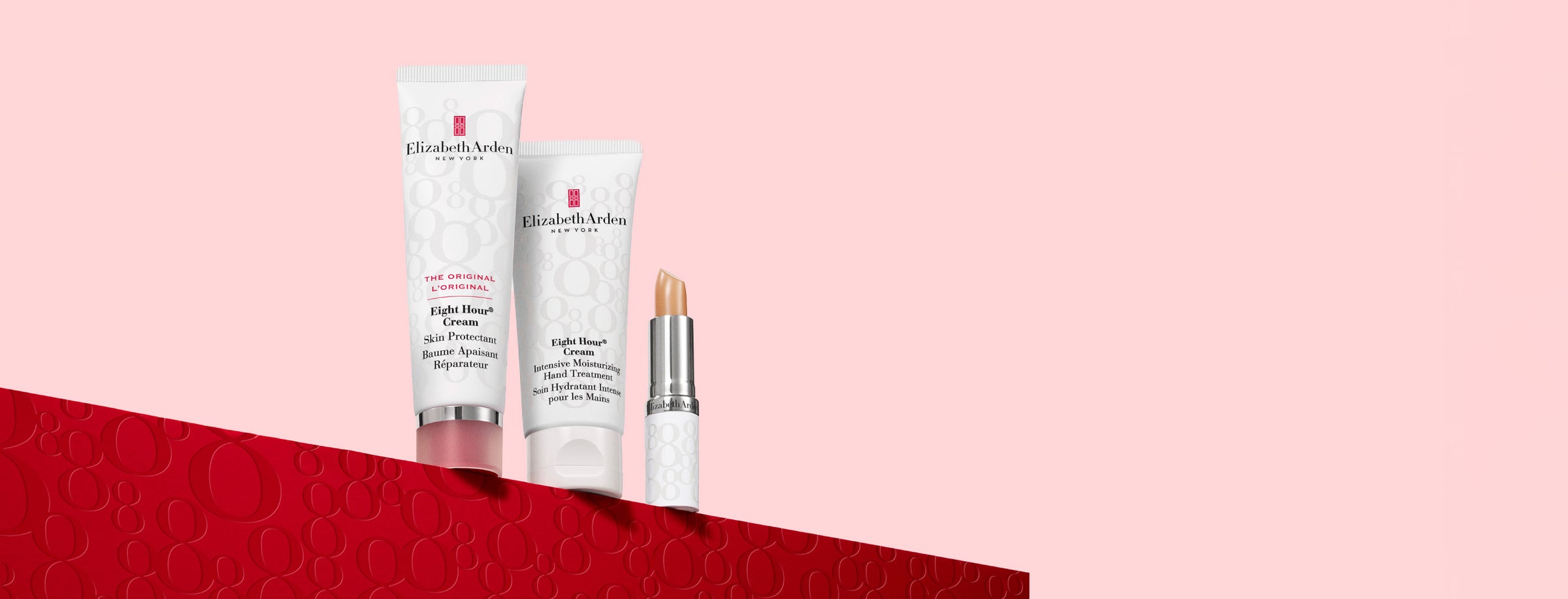 Elizabeth Arden skincare products on a pink and red background