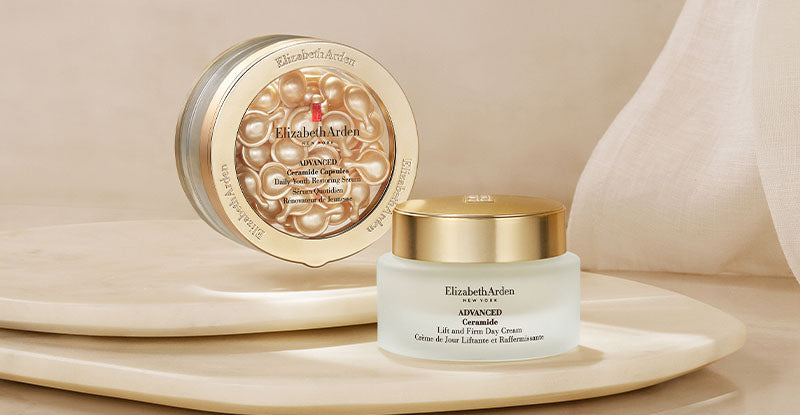 Elizabeth Arden capsules serum and moisturizer on a beige background