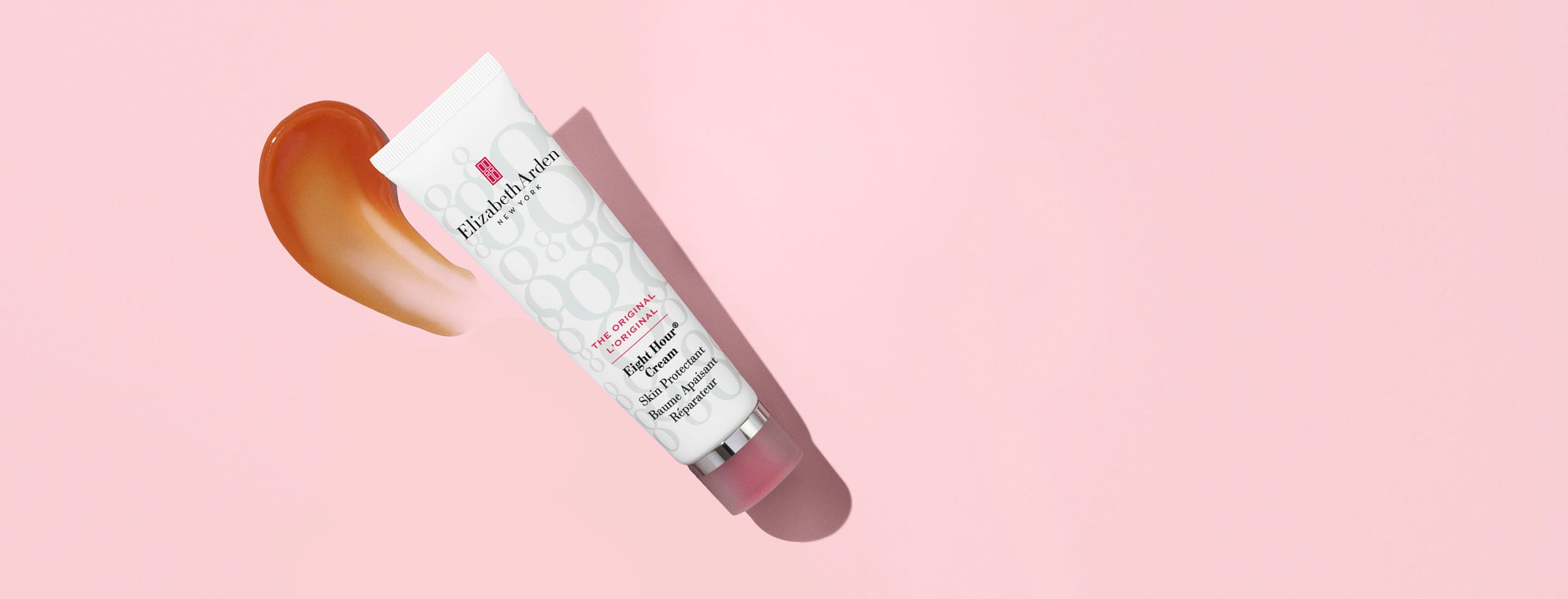 Elizabeth Arden Eight Hour Skin Protectant on a pink background