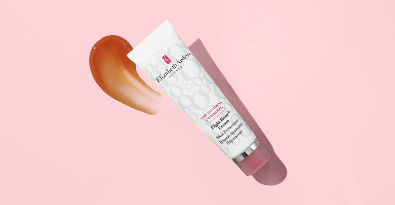 Elizabeth Arden Eight Hour Skin Protectant on a pink background