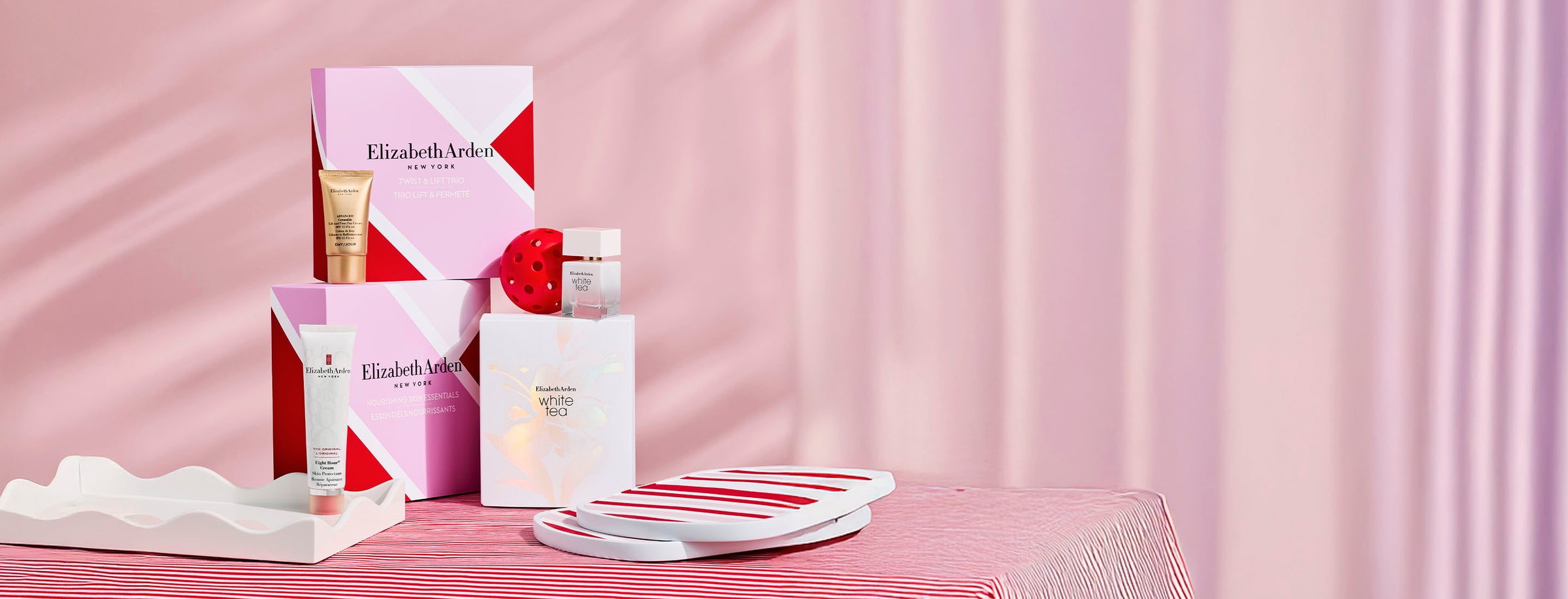 Elizabeth Arden skincare products on a pink background