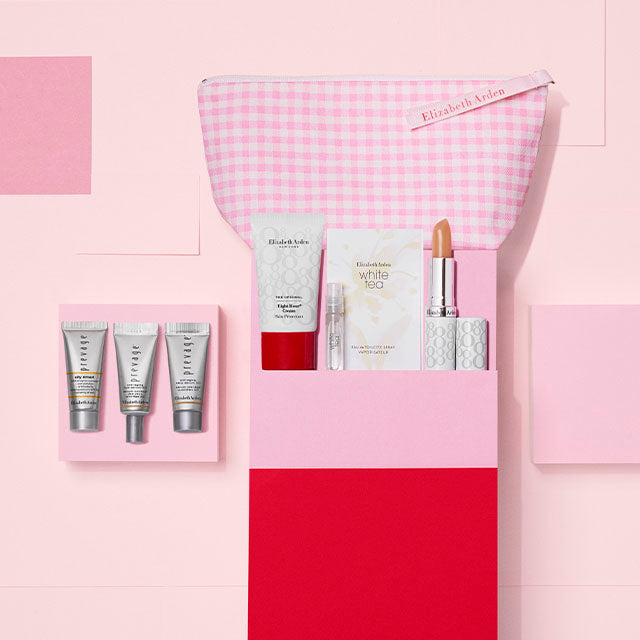 Cosmetic products and bag on a pink background