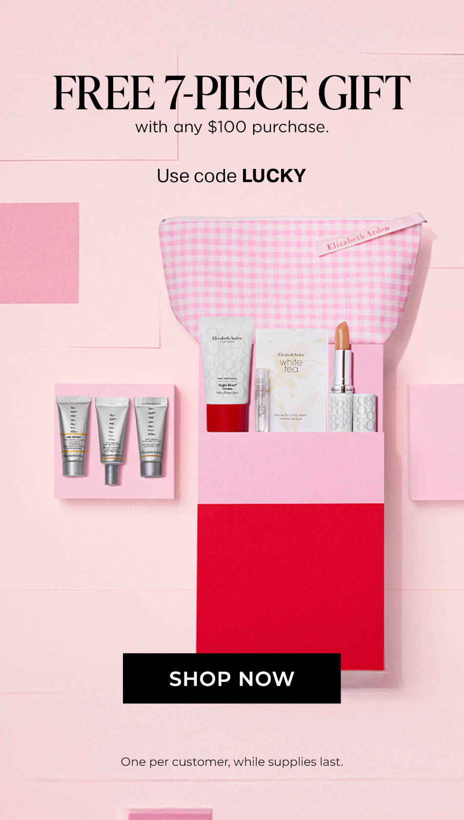 Promotional image of a free 7-piece gift with a $100 purchase, featuring a pink and red gift set on a light pink background.
