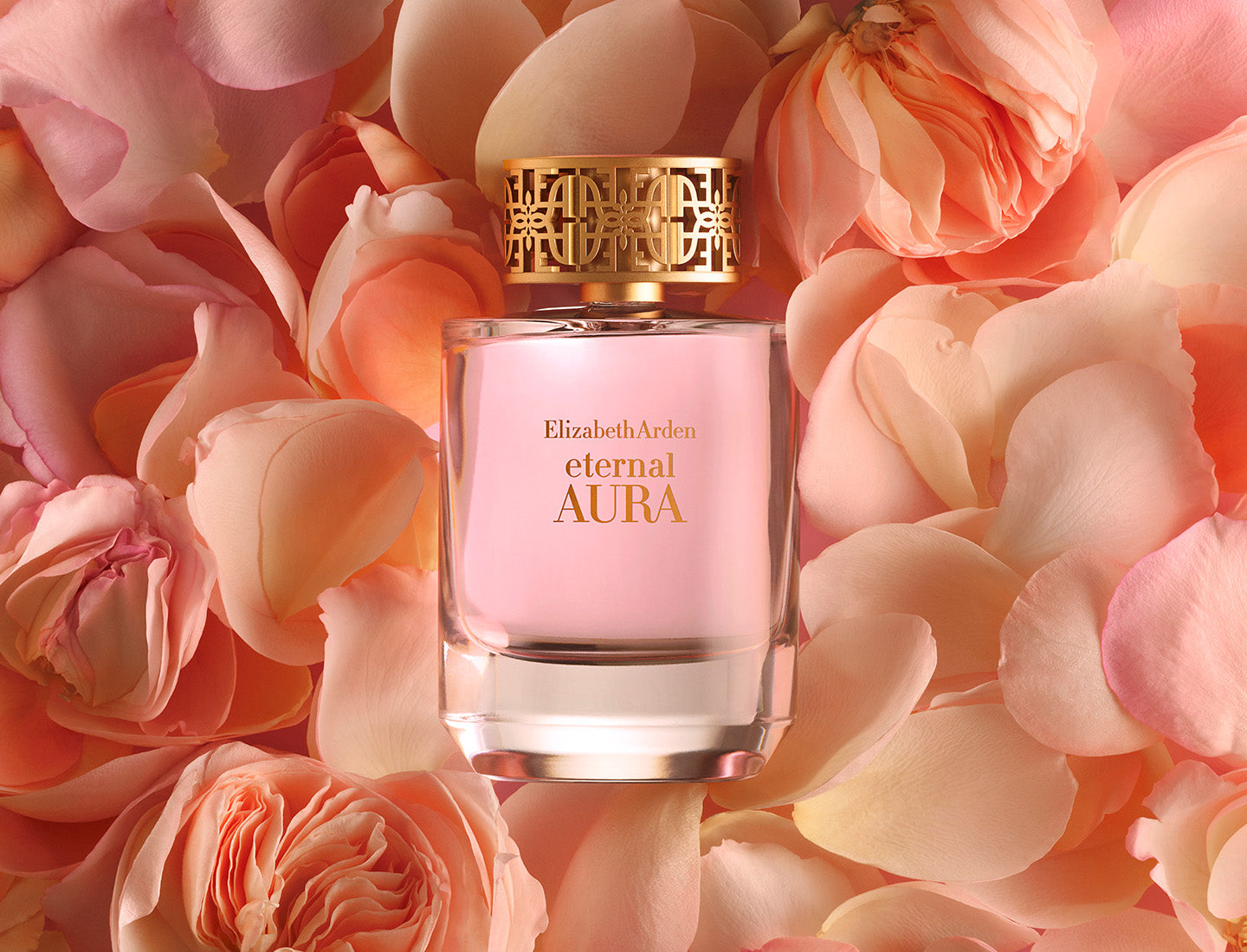 Elizabeth Arden Eternal Aura perfume bottle surrounded by pink flowers