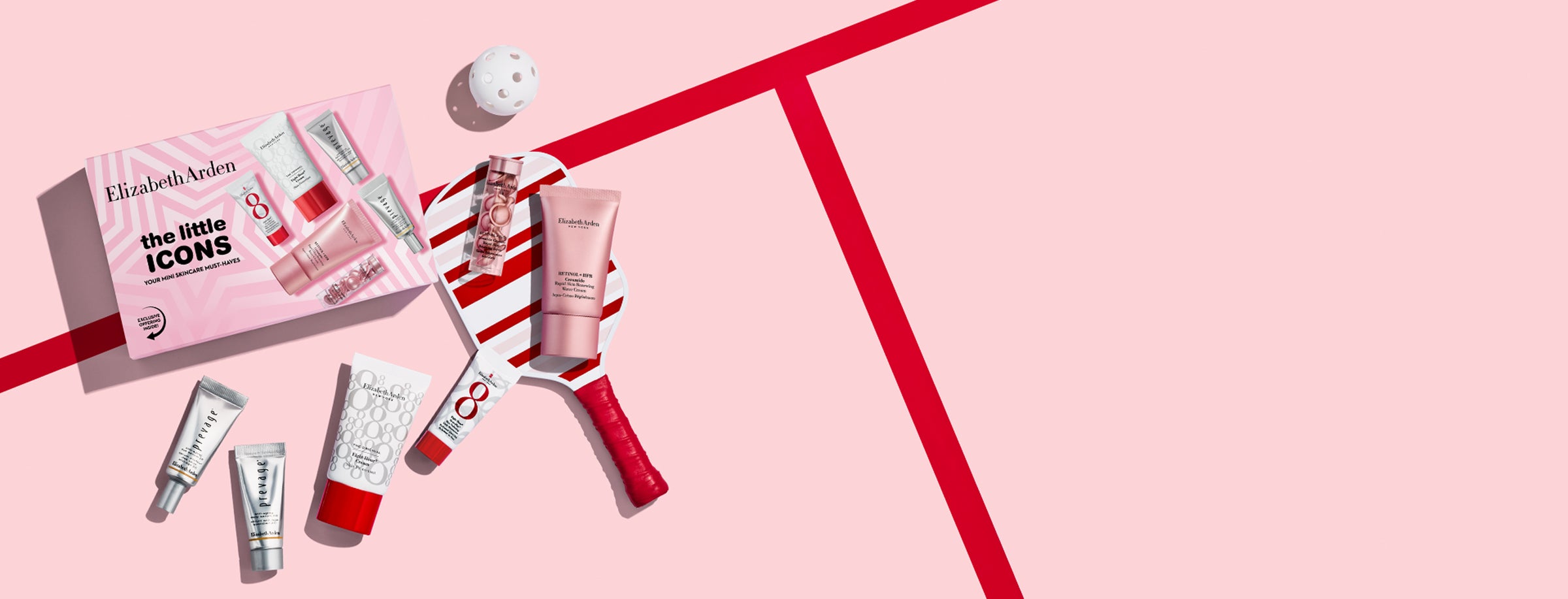 Elizabeth Arden skincare set with pink and white packaging on a pink background next to a pickle ball paddle and ball