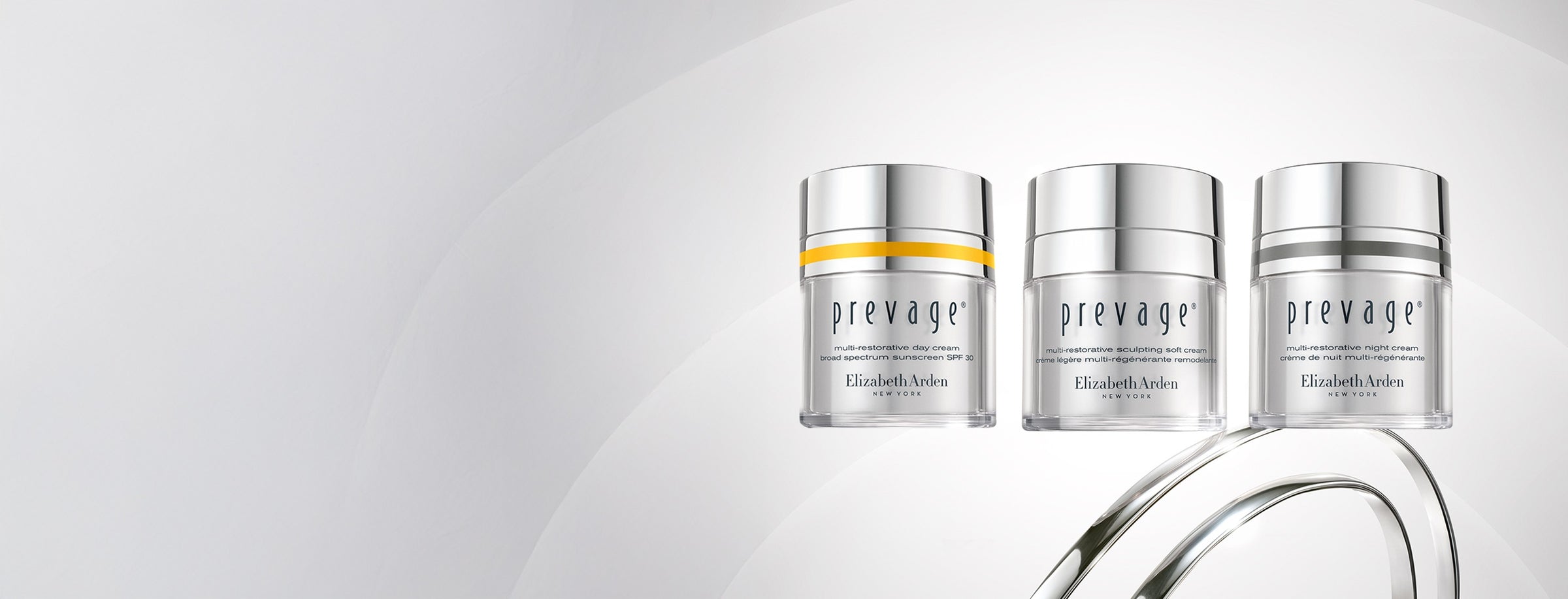 Three jars of Prevage moisturizers product on a light gray background