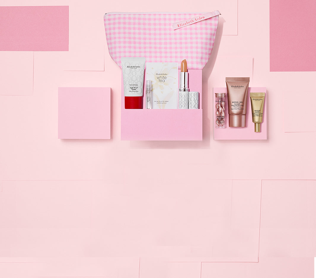 visual of a 7-piece sample gift set on a pink checkered background

