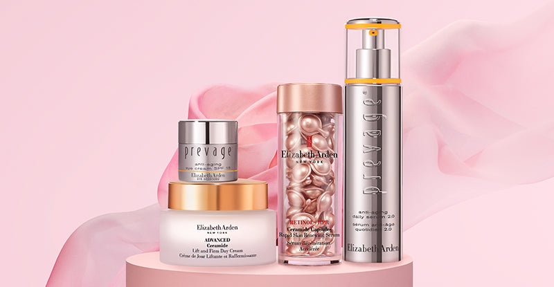 Set of Elizabeth Arden skincare products on a pink background