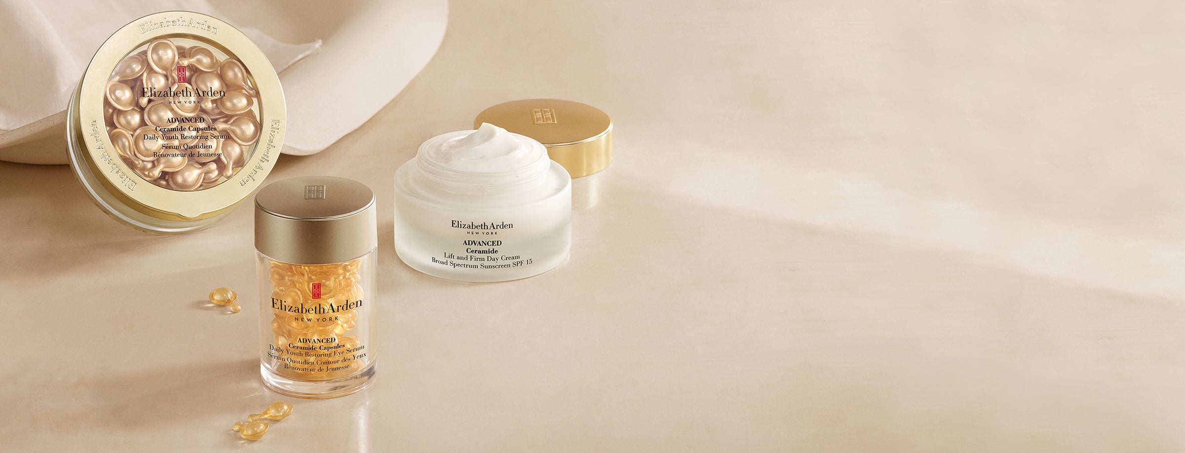 Products from the Advanced Ceramide Collection on a beige background