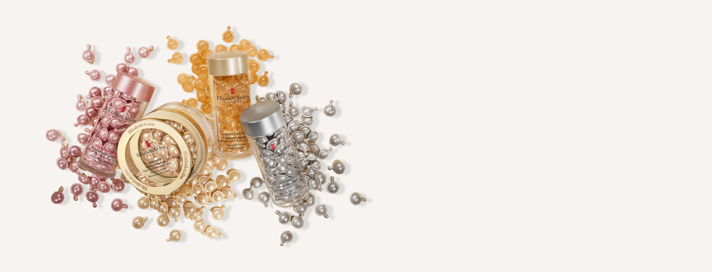 Elizabeth Arden Capsule Serums spilled on beige background