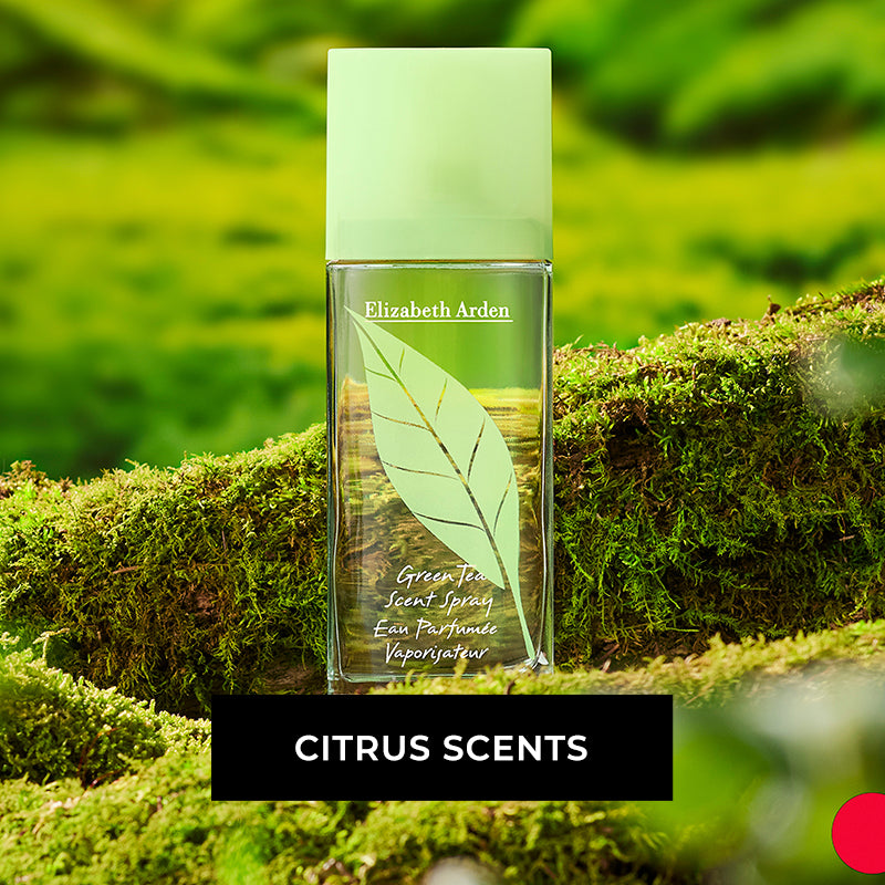 Elizabeth Arden Green Tea fragrance sitting on green moss/grass. CTA reads "CITRUS SCENTS"