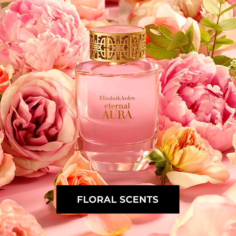 Elizabeth Arden Eternal Aura fragrance surrounded by pink flowers. CTA reads "FLORAL SCENTS"