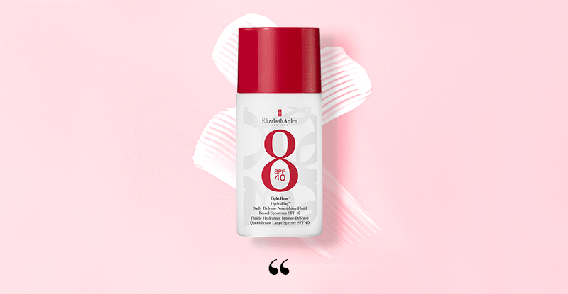 Eight Hour SPF 40 Fluid on a texture swipe on a pink background with a quotation mark to signal the copy on the banner is a quote,
