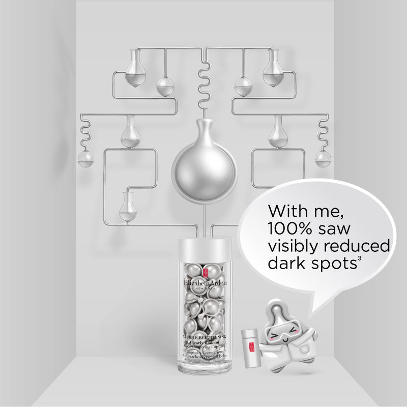 Silver carton-like serum capsule with quote "With me, 100% saw visibly reduced dark spots 3" next to Visible Brightening Capsules on a silver background