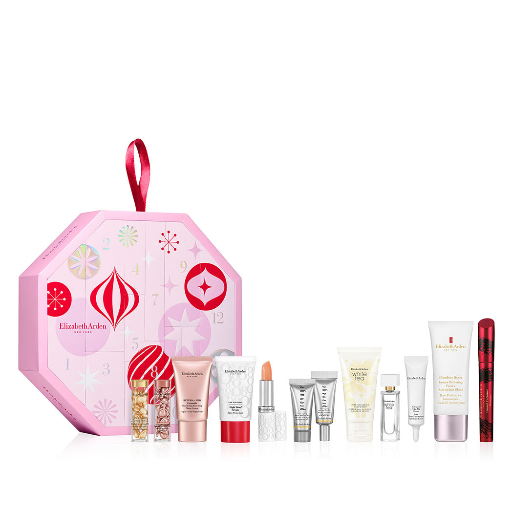 Pink octagonal Elizabeth Arden advent calendar box with numbered doors and a red ribbon, with its 12 products lined up in front
