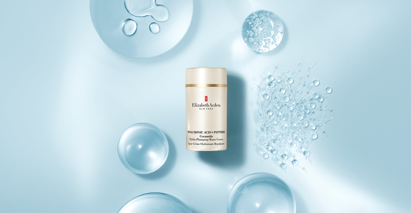 Hyaluronic Acid + Peptides Water Cream with ingredients surrounding it with a blue background