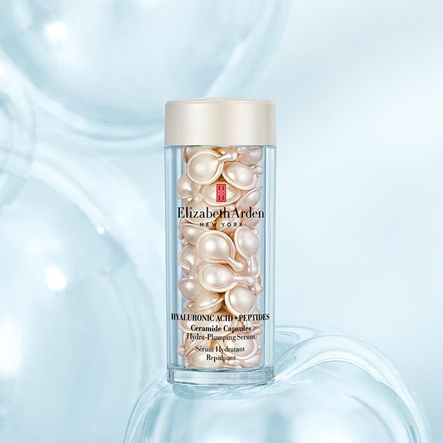 Elizabeth Arden serum capsules on a light blue background