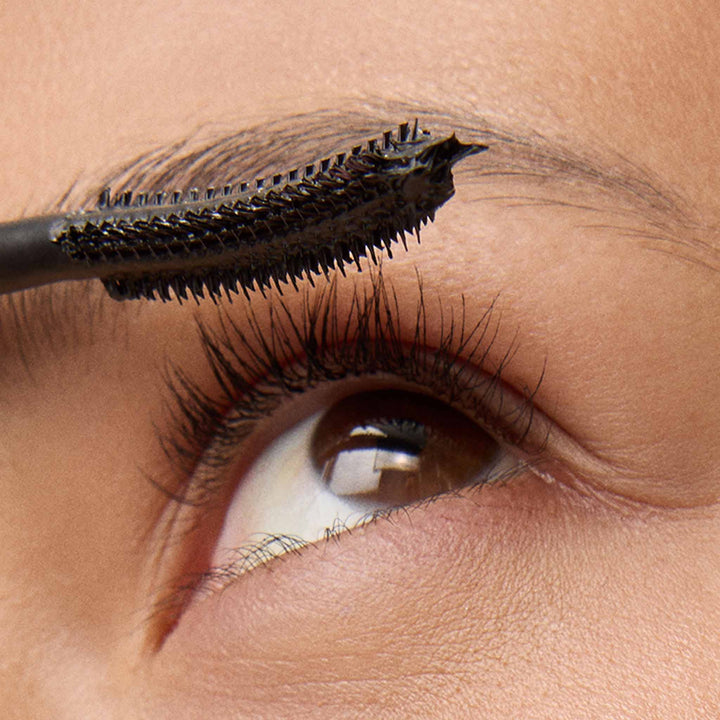 Close up of a model's eye with the grand entrance mascara applied